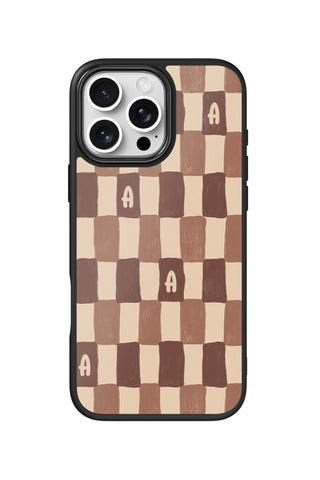 Flat lay view of personalized mocha check initial design on custom iPhone 16 Pro Max case by MultiCustomize