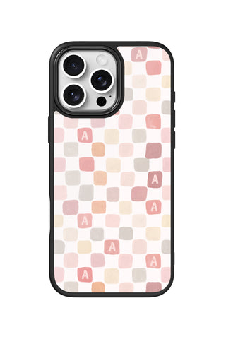 Flat lay view of personalized watercolor checkers initial design on custom iPhone 16 Pro Max case by MultiCustomize