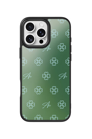 Flat lay view of personalized lucky heart clover initials design on custom iPhone 16 Pro Max case by MultiCustomize