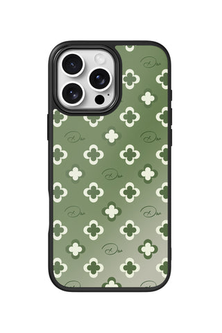 Flat lay view of personalized olive clover initials design on custom iPhone 16 Pro Max case by MultiCustomize