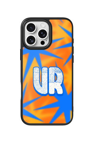 Flat lay view of personalized blue burst monogram design on custom iPhone 16 Pro Max case by MultiCustomize