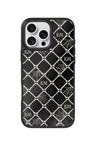 Flat lay view of personalized bone lattice monogram design on custom iPhone 16 Pro Max case by MultiCustomize