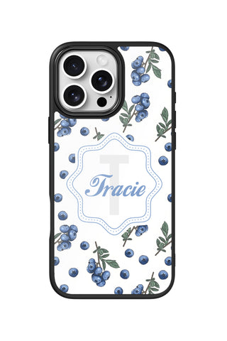 Flat lay view of personalized botanical blueberries monogram design on custom iPhone 16 Pro Max case by MultiCustomize