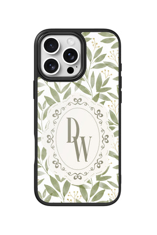 Flat lay view of personalized botanical monogram design on custom iPhone 16 Pro Max case by MultiCustomize