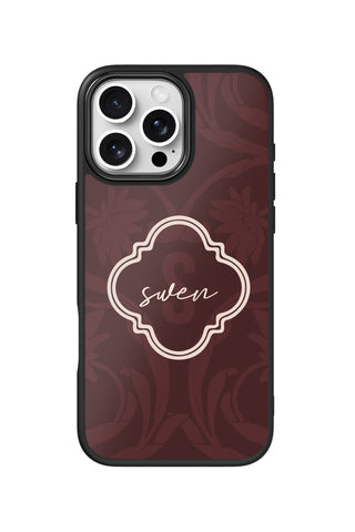Flat lay view of personalized burgundy garden monogram design on custom iPhone 16 Pro Max case by MultiCustomize
