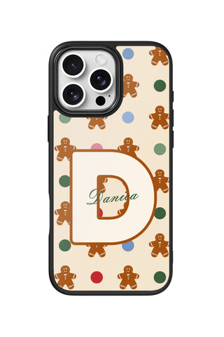 Flat lay view of personalized christmas gingerbread monogram design on custom iPhone 16 Pro Max case by MultiCustomize