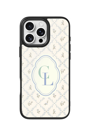 Flat lay view of personalized countryside bloom monogram design on custom iPhone 16 Pro Max case by MultiCustomize