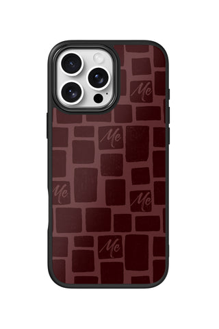 Flat lay view of personalized dark cherry bricks monogram design on custom iPhone 16 Pro Max case by MultiCustomize