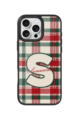 Flat lay view of personalized holiday tartan monogram design on custom iPhone 16 Pro Max case by MultiCustomize