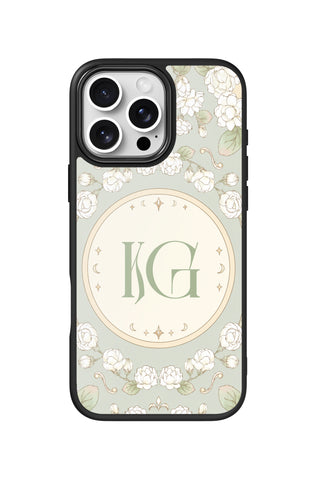 Flat lay view of personalized muted green bloom monogram design on custom iPhone 16 Pro Max case by MultiCustomize