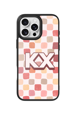Flat lay view of personalized peach watercolor grid monogram design on custom iPhone 16 Pro Max case by MultiCustomize