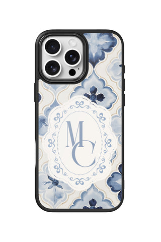 Flat lay view of personalized porcelain aesthetic monogram design on custom iPhone 16 Pro Max case by MultiCustomize