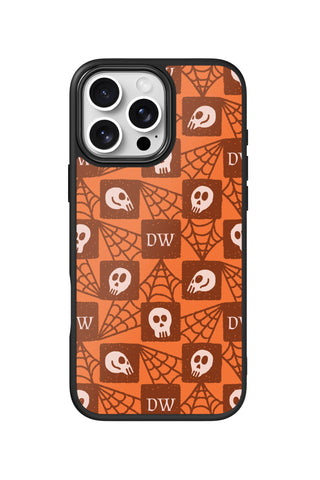 Flat lay view of personalized skull tiles monogram design on custom iPhone 16 Pro Max case by MultiCustomize