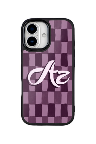 Flat lay view of personalized plum check monogram design on custom iPhone 17 case by MultiCustomize
