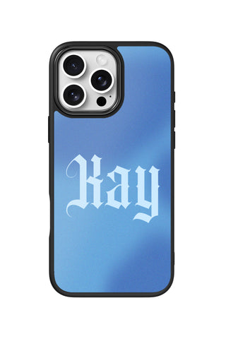 Flat lay view of personalized blue aura Text design on custom iPhone 16 Pro Max case by MultiCustomize